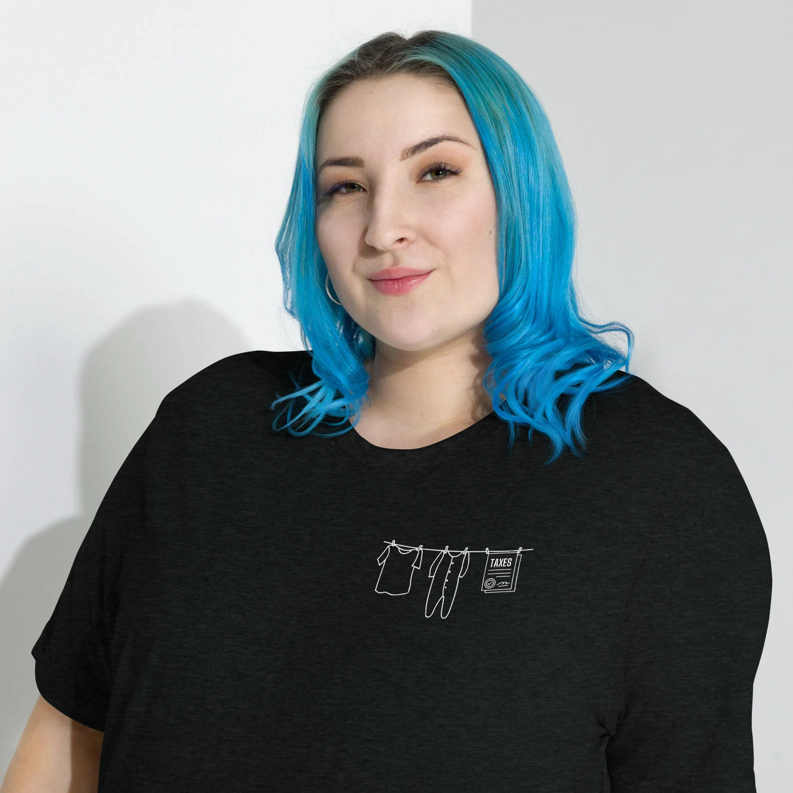 Laundry and taxes t-shirt model in black portrait shot