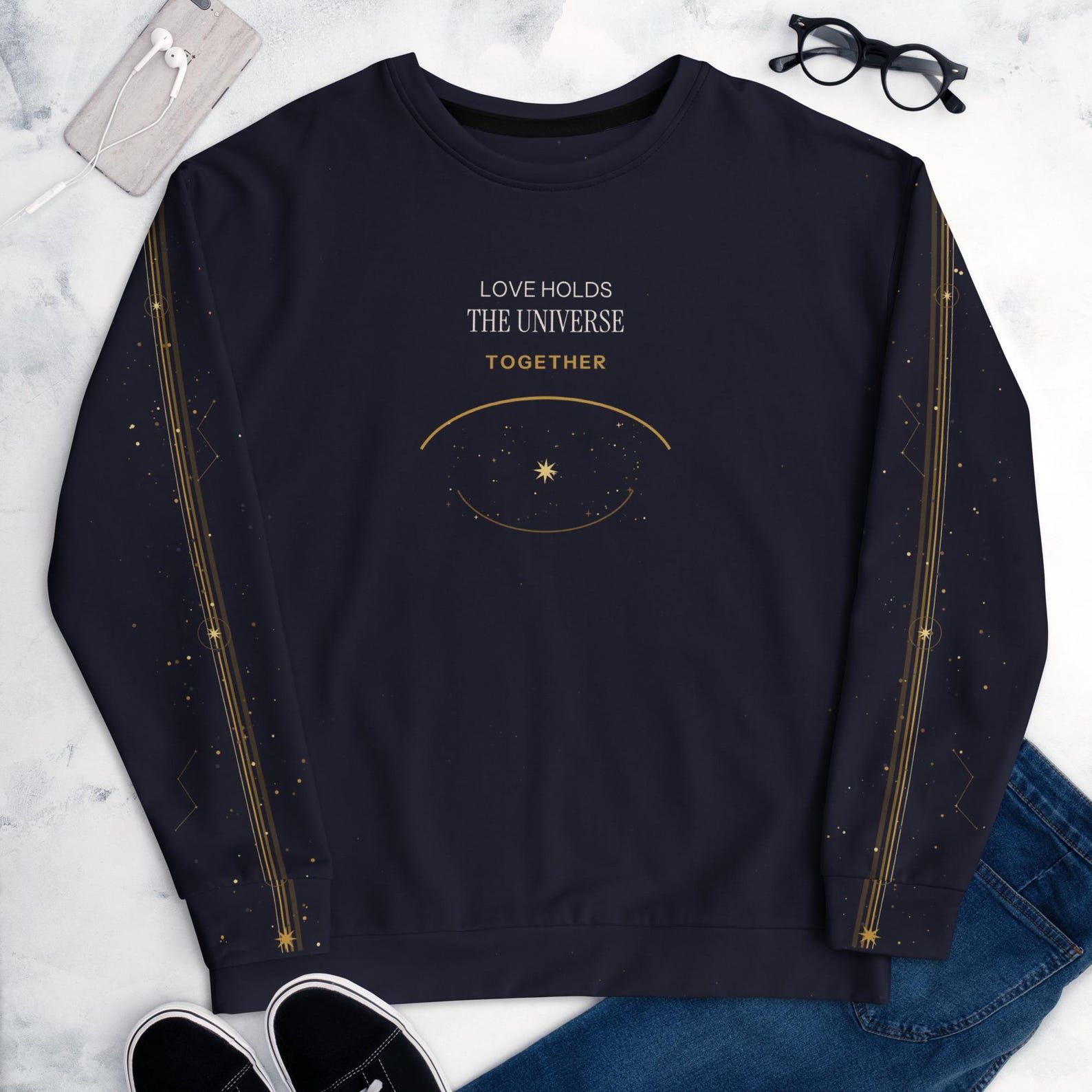 Love Holds the Universe Together sweatshirt laid flat to show the front statement and full sleeve currents