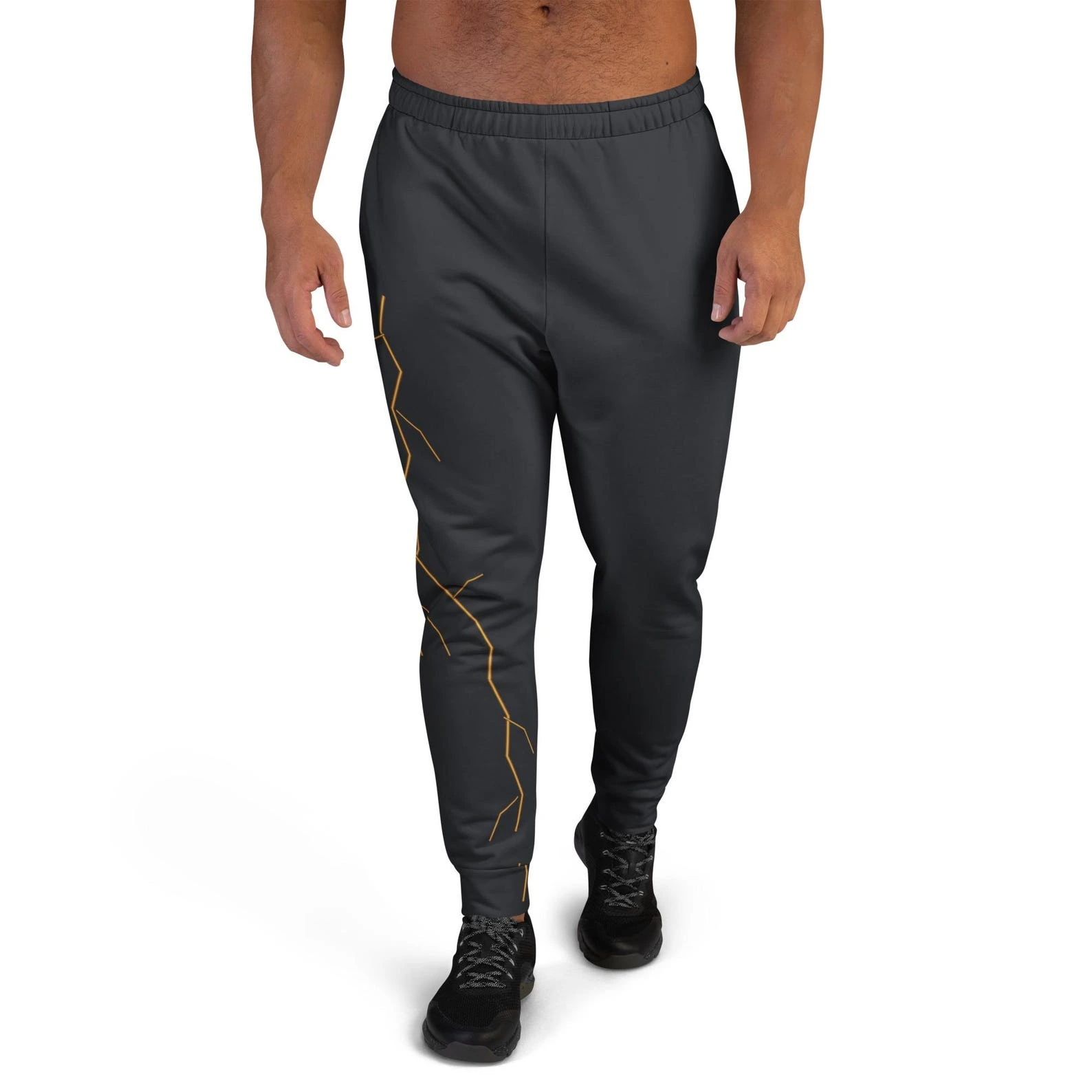 Front view of a model in dark Mended Light joggers with one gold-toned repair branching down the outer right leg